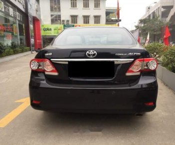 Toyota Corolla altis 1.8G  2014 - Bán xe cũ Toyota Corolla altis 1.8G năm 2014, màu đen