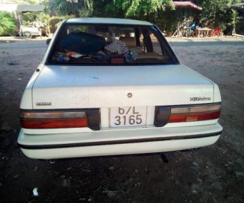 Nissan Bluebird   1983 - Bán ô tô Nissan Bluebird đời 1983, màu trắng, đăng kí lần đầu năm 2000 