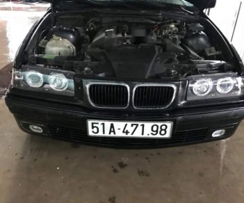 BMW 3 Series  320i 1997 - Bán ô tô BMW 3 Series 320i đời 1997, màu đen, xe nhập, 140 triệu