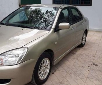 Mitsubishi Lancer   2003 - Bán xe Mitsubishi Lancer năm 2003, màu vàng, nhập khẩu 