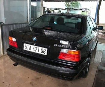 BMW 3 Series  320i 1997 - Bán ô tô BMW 3 Series 320i đời 1997, màu đen, xe nhập, 140 triệu