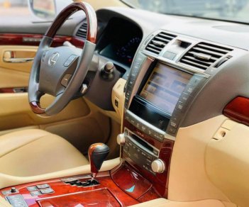 Lexus LS 2010 - Bán xe Lexus LS460L sản xuất 2010 màu trắng, 5 ghế có matxa, rada, nâng hạ gầm