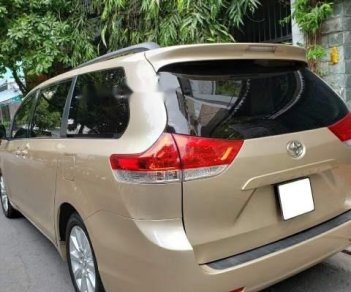 Toyota Sienna 2010 - Bán ô tô Toyota Sienna năm 2010, màu vàng, nhập khẩu nguyên chiếc