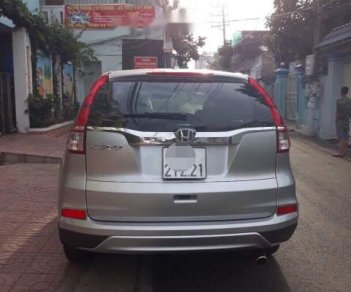 Honda CR V 2.4AT 2015 - Bán Honda CR V 2.4AT sản xuất 2015, màu bạc chính chủ, giá chỉ 880 triệu