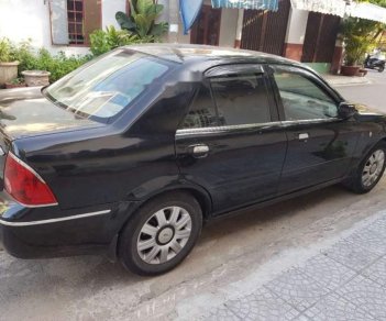 Ford Laser   1.8   2004 - Bán Ford Laser 1.8 đời 2004, màu đen, số tự động 