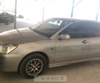 Mitsubishi Lancer    GLX 1.6 AT  2004 - Cần bán Mitsubishi Lancer GLX 1.6 AT sản xuất 2004, xe gia đình đang sử dụng chạy êm tốt