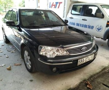 Ford Laser   2004 - Bán ô tô Ford Laser năm sản xuất 2004, màu đen, nhập khẩu