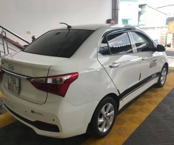 Hyundai Grand i10 1.2AT   2018 - Bán Hyundai Grand i10 1.2AT sedan, màu trắng, số tự động, sản xuất 2018, đi 8000km