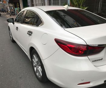 Mazda 6 2.0 2016 - Gia đình cần bán Mazda 6 sản xuất 2016, số tự động, bản 2.0, màu trắng