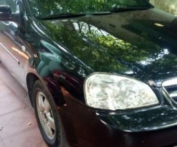 Daewoo Lacetti 2011 - Bán ô tô Daewoo Lacetti sản xuất 2011, màu đen xe gia đình