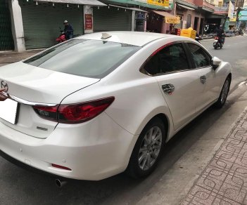 Mazda 6 2.0 2016 - Gia đình cần bán Mazda 6 sản xuất 2016, số tự động, bản 2.0, màu trắng