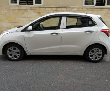 Hyundai Grand i10  1.0MT 2014 - Cần bán xe Hyundai Grand i10 1.0MT 2014, màu bạc, xe nhập chính chủ 