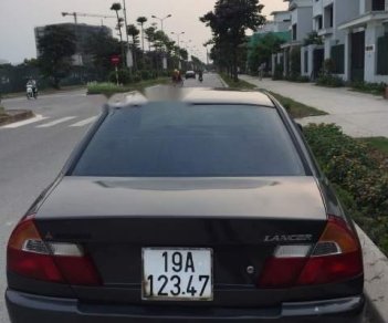 Mitsubishi Lancer   2001 - Bán Mitsubishi Lancer 2001, màu đen xe gia đình, giá chỉ 120 triệu