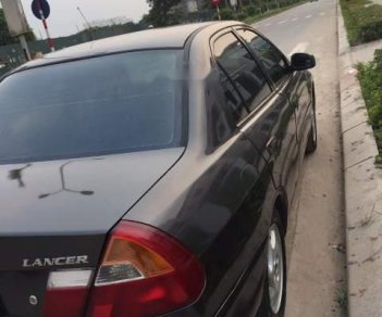 Mitsubishi Lancer   2001 - Bán Mitsubishi Lancer 2001, màu đen xe gia đình, giá chỉ 120 triệu