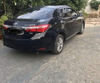 Toyota Corolla altis 1.8MT 2017 - Bán Toyota Corolla altis 1.8MT 2017, màu đen xe gia đình