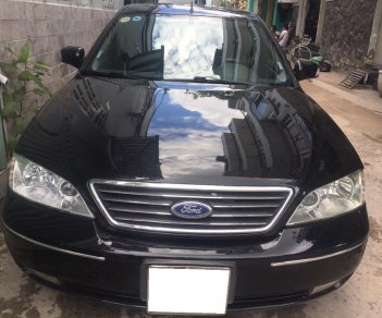 Ford Mondeo 2003 - Bán Ford Mondeo 2003 đk 2004 tự động, màu đen tuyệt đẹp