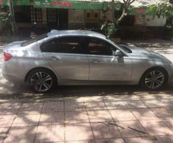 BMW 3 Series 320i 2014 - Bán BMW 3 Series 320i 2014, màu bạc, giá chỉ 835 triệu