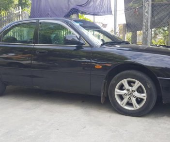Mazda 626 1998 - Cần bán Mazda 626 sản xuất 1998, màu đen xe nhập, giá chỉ 118tr