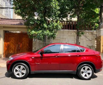 BMW X6 xDrive35i 2012 - Bán xe BMW X6 xDrive35i đời 2013, màu đỏ, xe nhập