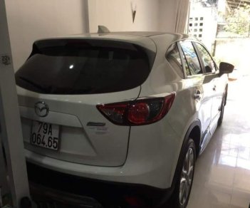 Mazda CX 5   2014 - Mình cần bán Mazda CX5 đời 2014 màu trắng, số tự động