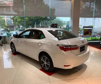 Toyota Corolla altis 1.8G AT 2019 - Bán ô tô Toyota Corolla Altis 1.8G AT sản xuất năm 2019, màu trắng giá cạnh tranh