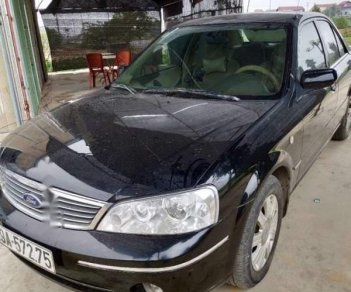 Ford Laser   Ghia   2004 - Cần bán xe Ford Laser Ghia sản xuất năm 2004, màu đen