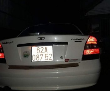 Daewoo Nubira  MT 2004 - Bán Daewoo Nubira MT năm 2004, màu trắng, 4 vỏ mới