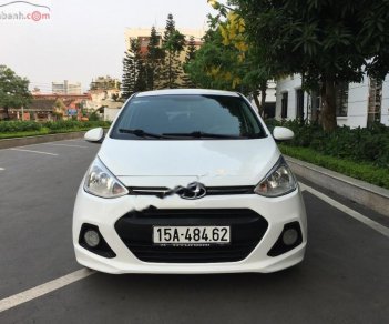 Hyundai Grand i10   1.2 AT 2015 - Cần bán lại xe Hyundai Grand i10 1.2 AT đời 2015, màu trắng, xe nhập chính chủ