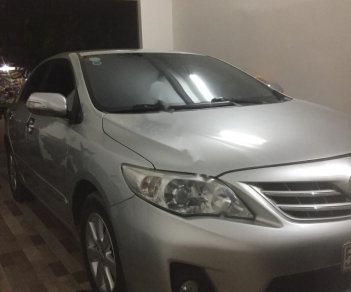 Toyota Corolla altis 1.8G AT 2012 - Cần bán Toyota Corolla Altis 1.8G AT 2012, màu bạc số tự động, giá tốt