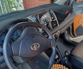 Toyota Vios J 2015 - Bán xe Toyota Vios J sản xuất năm 2015, màu vàng, ít sử dụng