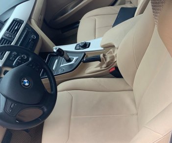 BMW 3 Series 320i 2014 - Cần bán xe BMW 320i 2014 ĐK 2015, số tự động màu trắng