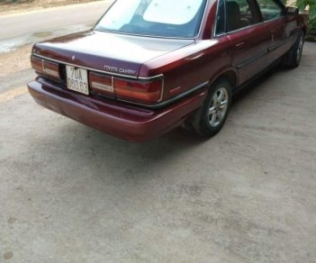 Toyota Camry   1990 - Cần bán Toyota Camry sản xuất 1990, màu đỏ, máy lạnh, tay lái trợ lực đầy đủ