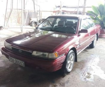 Toyota Camry   1990 - Cần bán Toyota Camry sản xuất 1990, màu đỏ, máy lạnh, tay lái trợ lực đầy đủ