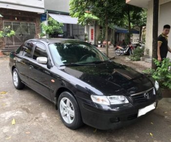 Mazda 626 2004 - Bán xe Mazda 626 đời 2004, màu đen, còn rất chất