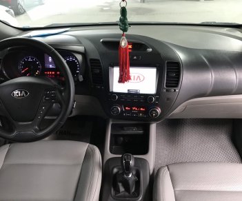 Kia K3 1.6MT 2014 - Bán Kia K3 1.6MT màu trắng, số sàn, sản xuất 2014, Đk 2015 một chủ đi 68000km