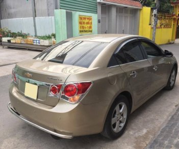 Chevrolet Cruze 2010 - Gia đình cần bán Cruze 2010, số sàn, màu vàng cát, gia đình sử dụng