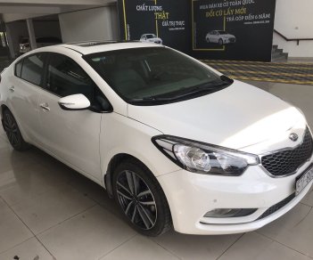 Kia K3 1.6AT 2016 - Bán Kia K3 1.6AT màu trắng, sản xuất 2016 biển Sài Gòn đi 33000km, xe đẹp