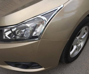 Chevrolet Cruze 2010 - Gia đình cần bán Cruze 2010, số sàn, màu vàng cát, gia đình sử dụng