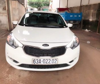 Kia K3   AT 2014 - Cần bán xe Kia K3 AT năm sản xuất 2014, màu trắng 
