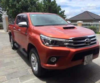 Toyota Hilux  G  2016 - Cần bán lại xe Toyota Hilux G sản xuất 2016, màu đỏ, nhập khẩu nguyên chiếc xe gia đình, 660 triệu