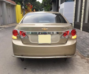 Chevrolet Cruze 2010 - Gia đình cần bán Cruze 2010, số sàn, màu vàng cát, gia đình sử dụng