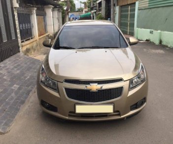 Chevrolet Cruze 2010 - Gia đình cần bán Cruze 2010, số sàn, màu vàng cát, gia đình sử dụng