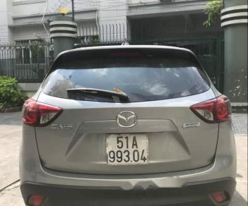 Mazda CX 5   2.0AT 2014 - Bán Mazda CX 5 2.0AT đời 2014, màu bạc, xe gia đình