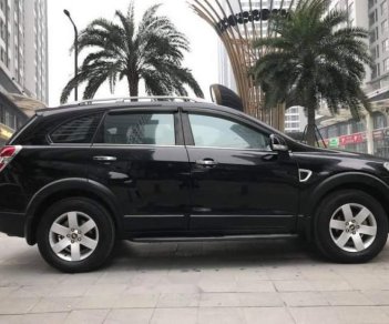 Chevrolet Captiva LT 2009 - Cần bán Chevrolet Captiva LT đời 2009, màu đen ít sử dụng