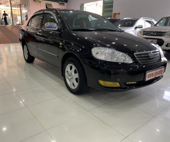 Toyota Corolla altis 1.8MT 2004 - Bán Toyota Corolla altis 1.8MT năm 2004, màu đen