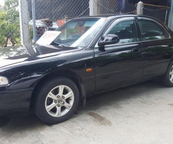 Mazda 626 1998 - Cần bán Mazda 626 đời 1998, màu đen, nhập khẩu
