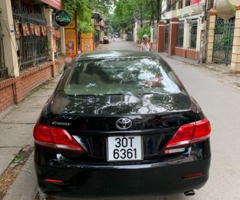 Toyota Camry   2009 - Bán Toyota Camry đời 2009, màu đen, đăng ký 2009, odo 75000 km