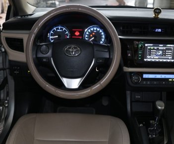 Toyota Corolla altis G 1.8AT 2014 - Cần bán Toyota Corolla altis G 1.8AT đời 2014, màu bạc giá cạnh tranh