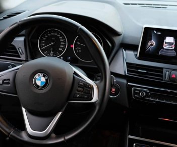 BMW 2 Series AT 2015 - Bán BMW 218i sx 2015 tự động màu xanh full option tuyệt đẹp