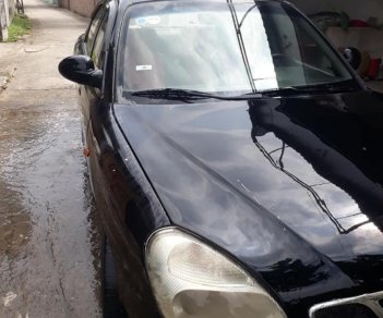 Daewoo Nubira II 1.6 2003 - Bán Daewoo Nubira II 1.6 đời 2003, màu đen, số sàn 